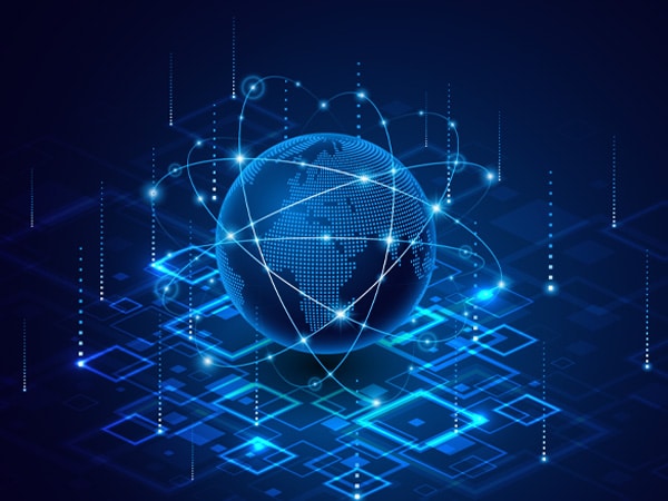 A glowing digital globe with dotted continents floats above a network of blue circuit-like lines and geometric shapes, symbolizing global technology and connectivity on a dark background.